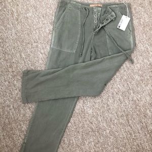 Joe’s Jeans cropped khakis with snap buttons.